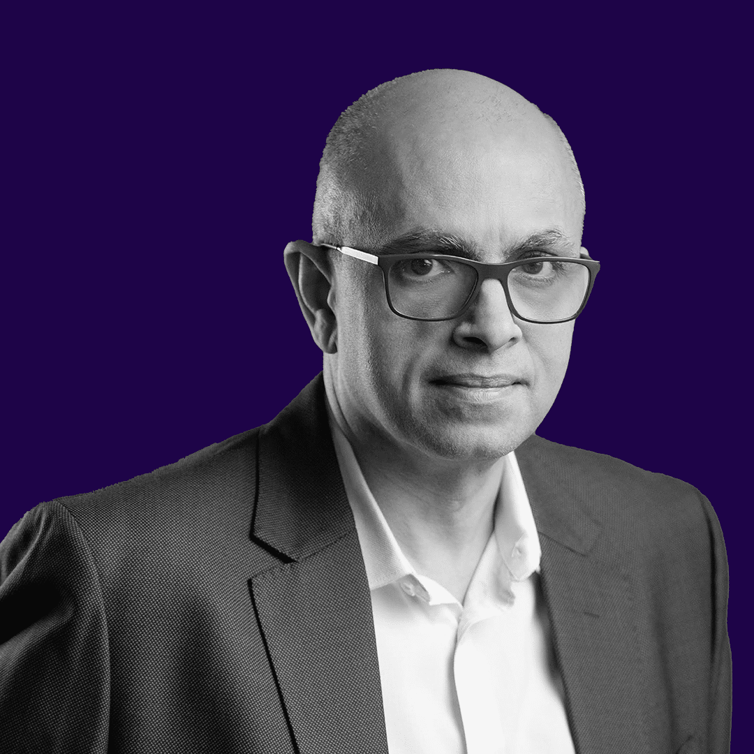 Man in suit against purple background